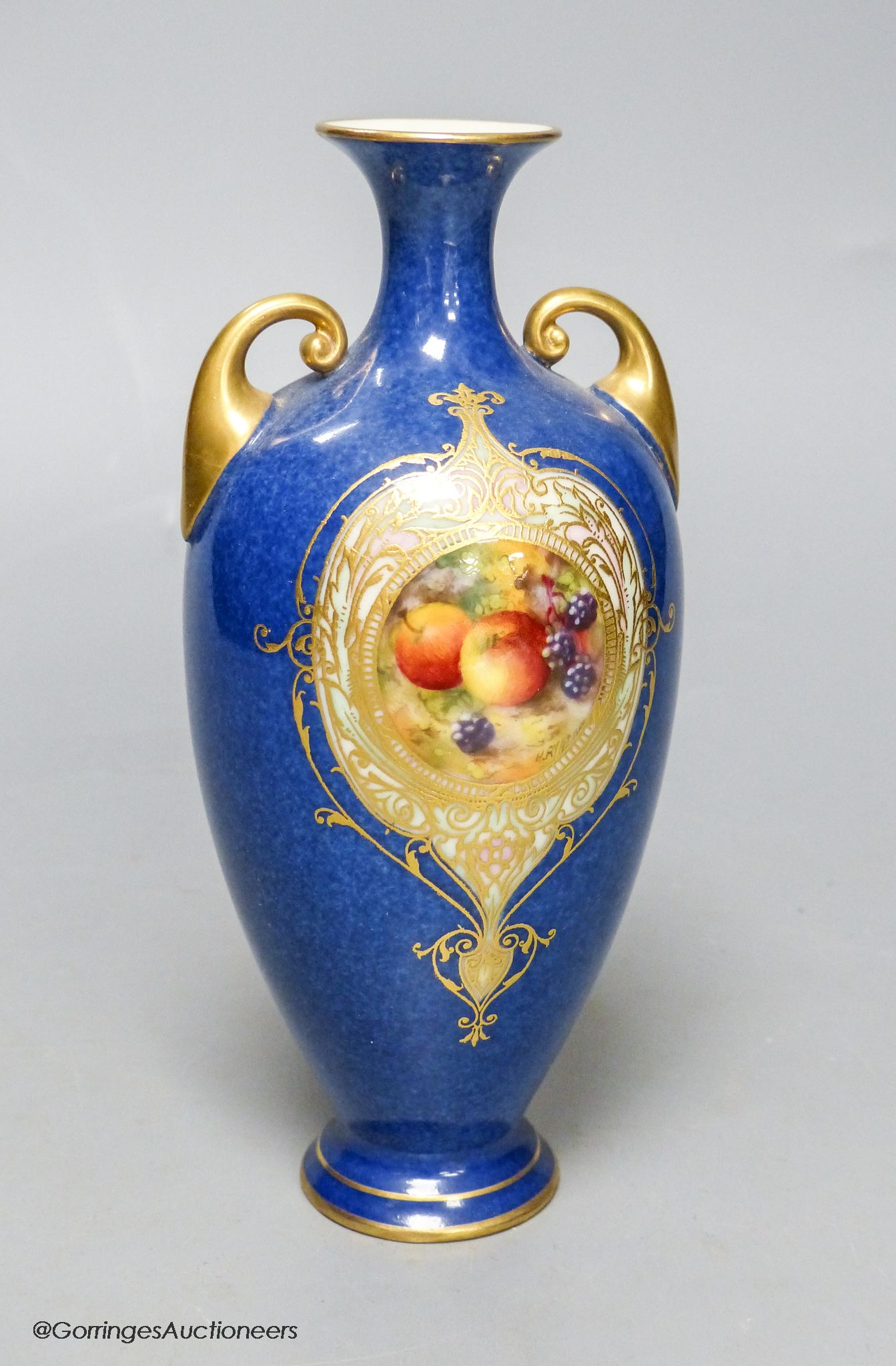 A Royal Worcester fruit painted powder blue vase, height 16.5cm